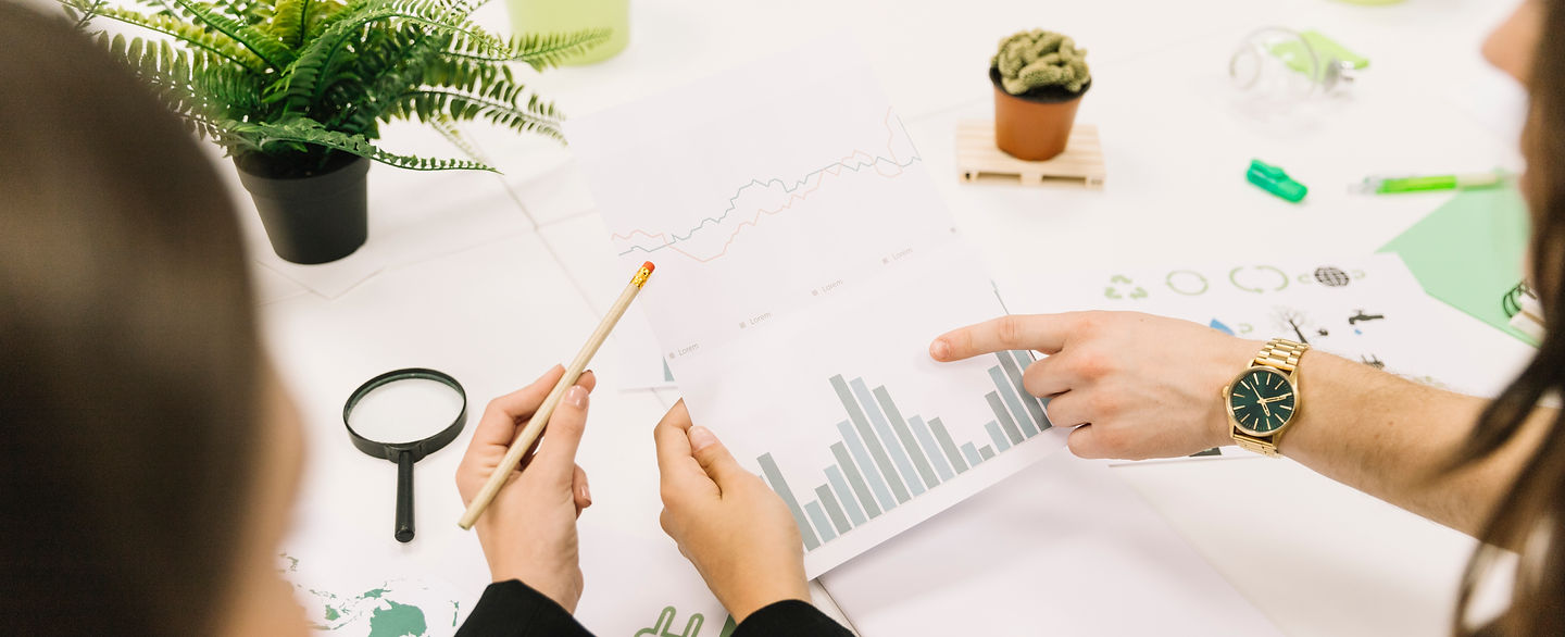 group-businesspeople-analyzing-graph-office.jpg